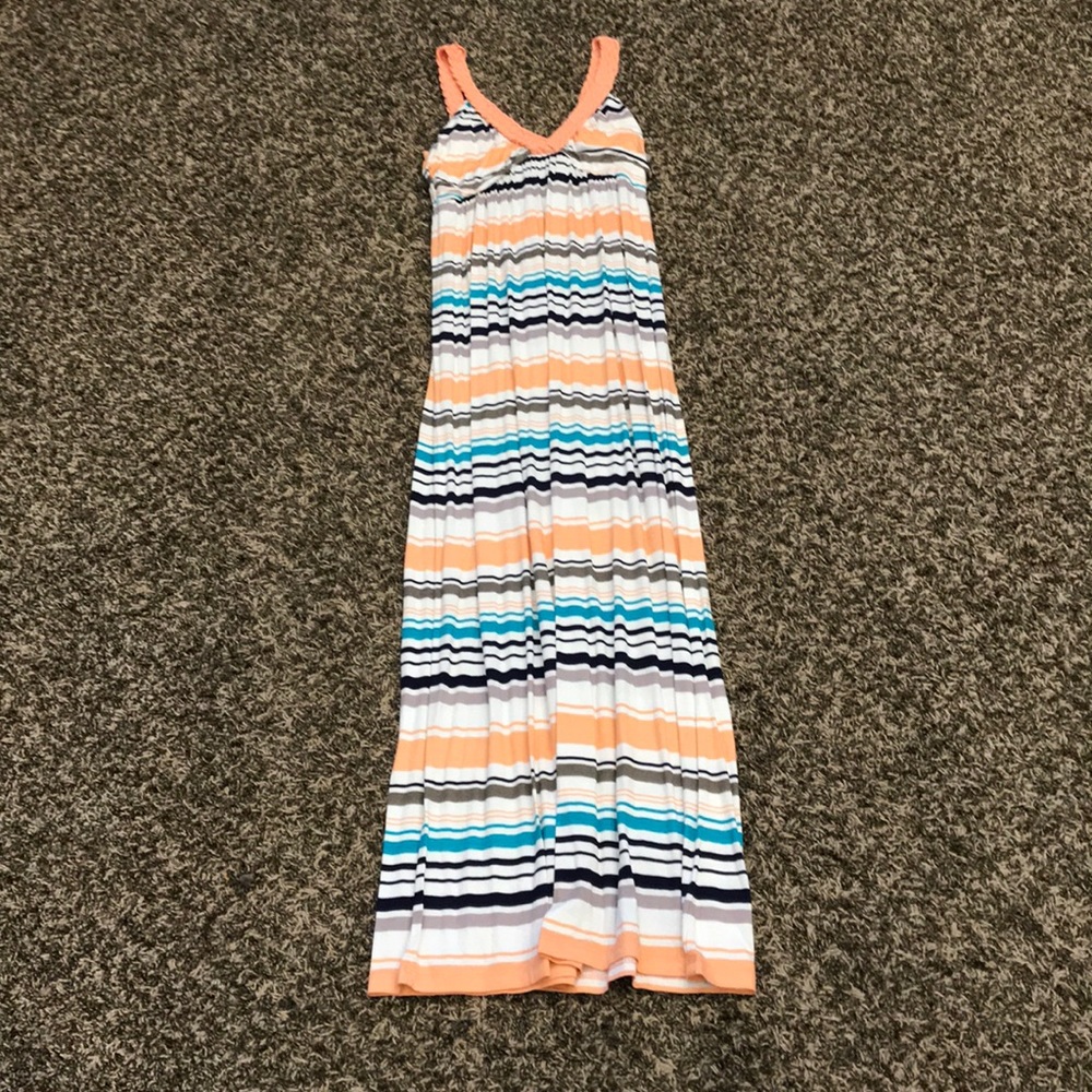 White,teal, peach with a dark blue black!